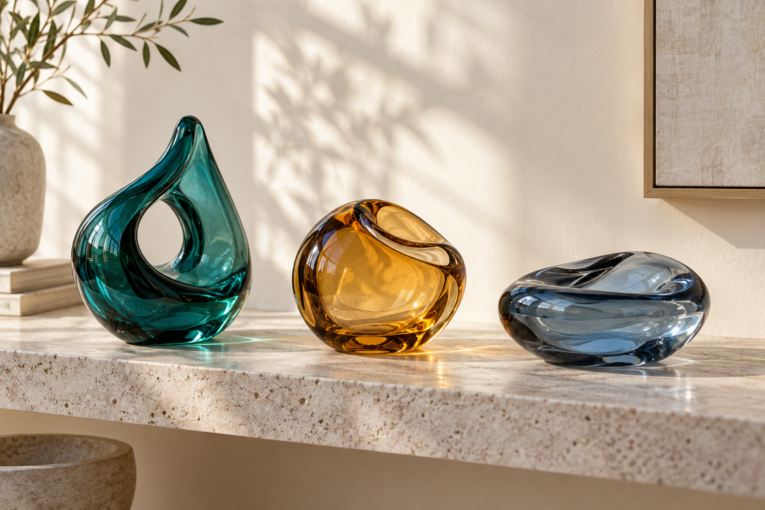 Teal amber and smoky-blue glass forms