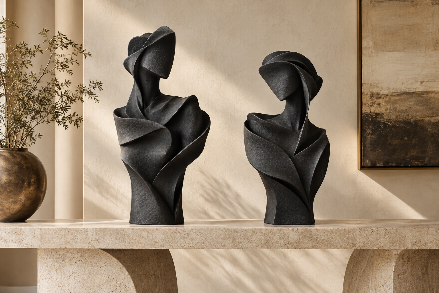 Matte-black sculptural busts in a luxury interior